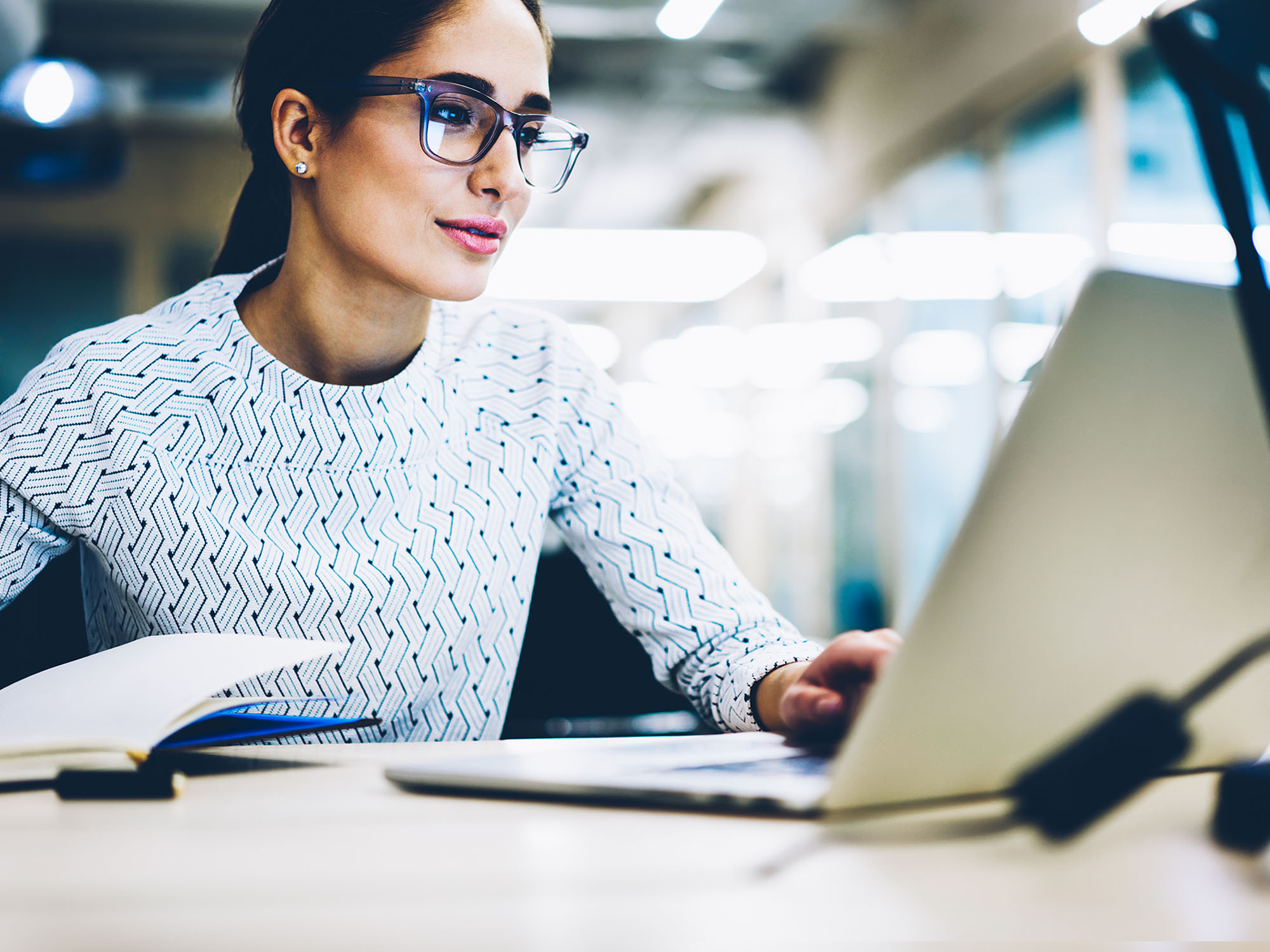 a lady working on laptop